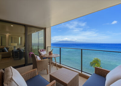 Lanei space with modern lounge seating and beverage table overlooking ocean