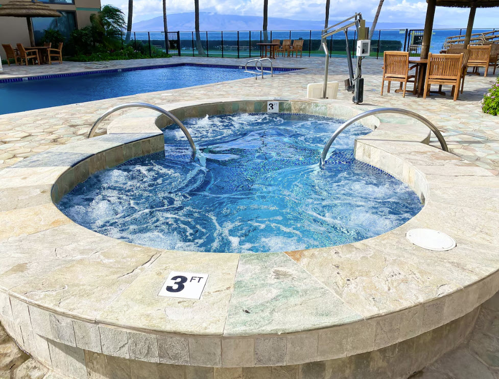 The Mahana poolside view of spa and pool water overlooking ocean