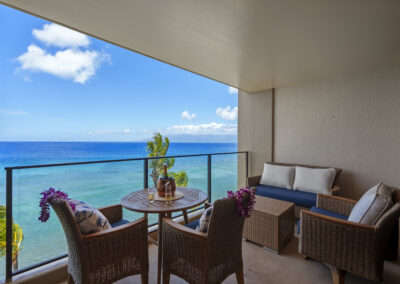 Lanei space with modern lounge seating and beverage table overlooking ocean